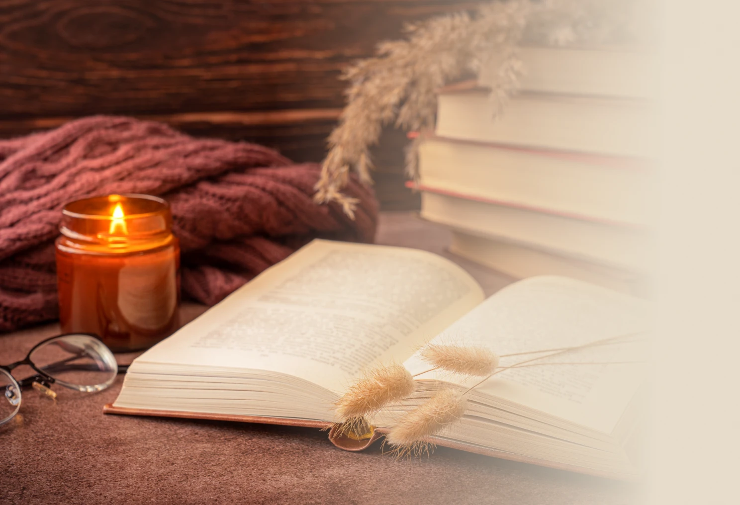 Cozy reading setup with candlelight